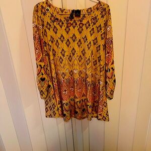 Beige tunic with rust and cream. Pretty neckline. Med.